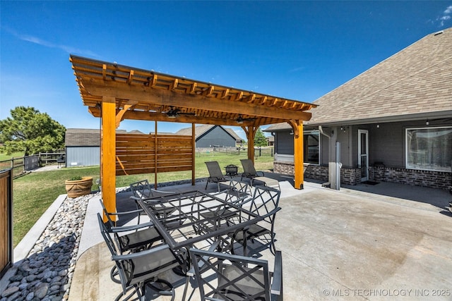 view of patio / terrace with a pergola, outdoor dining space, a fenced backyard, an outdoor structure, and a storage unit