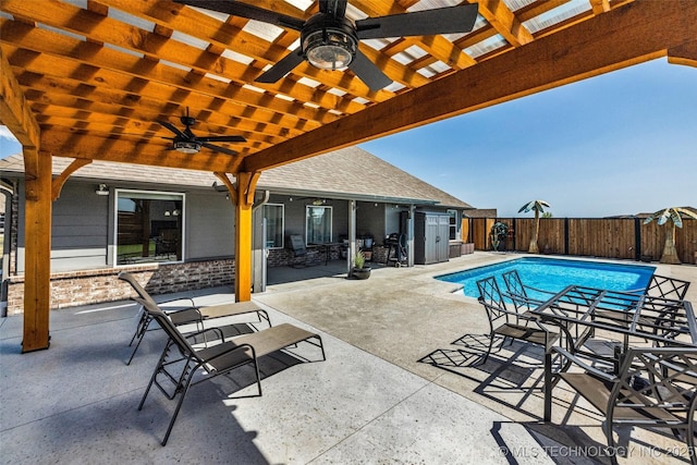 view of pool with a pergola, a fenced backyard, a ceiling fan, and a fenced in pool