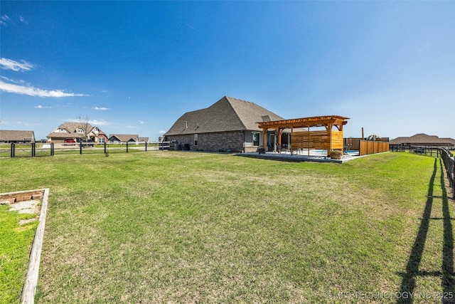 view of yard featuring a fenced backyard and a pergola