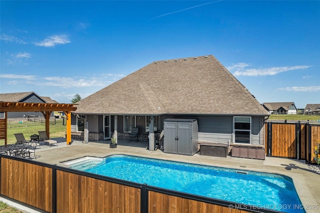 view of swimming pool with a fenced backyard, a patio, and a fenced in pool