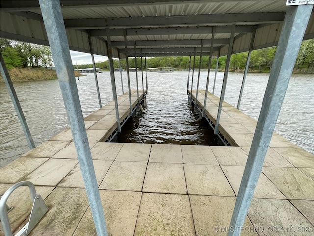view of dock with a water view