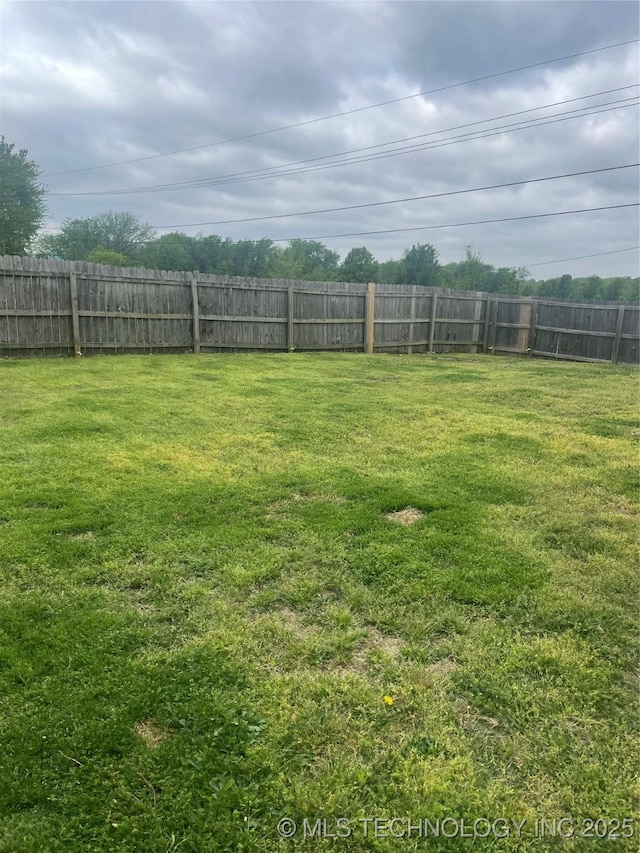 view of yard featuring fence