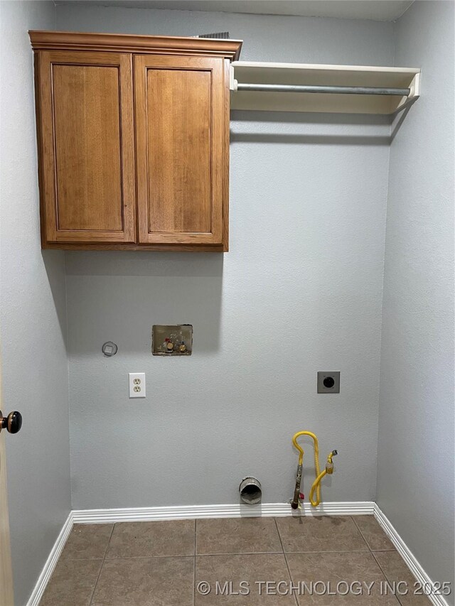 9700 E 110th St N, Owasso, OK 74055 - laundry room with hookup for a gas dryer, washer hookup, hookup for an electric dryer, and tile patterned floors