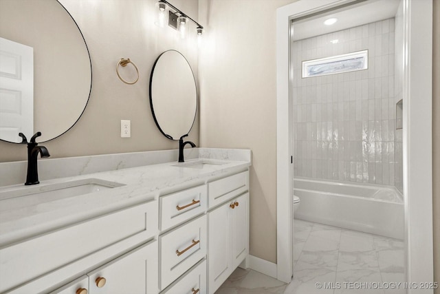 4231 W 4th St, Skiatook, OK 74070 - bathroom with marble look tile flooring, double vanity, and shower / washtub combination