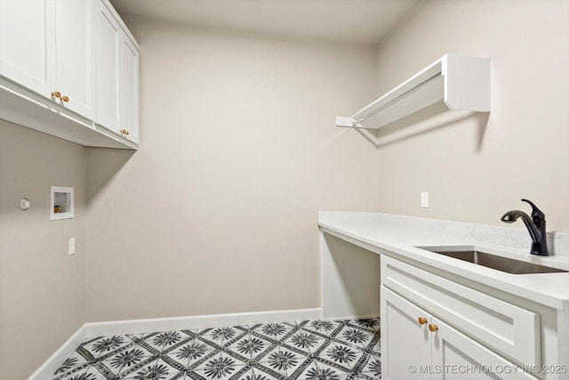 4231 W 4th St, Skiatook, OK 74070 - washroom featuring cabinet space, washer hookup, and light floors