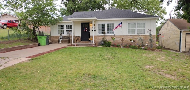 view of front of home with stone siding, board and batten siding, and a shingled roof