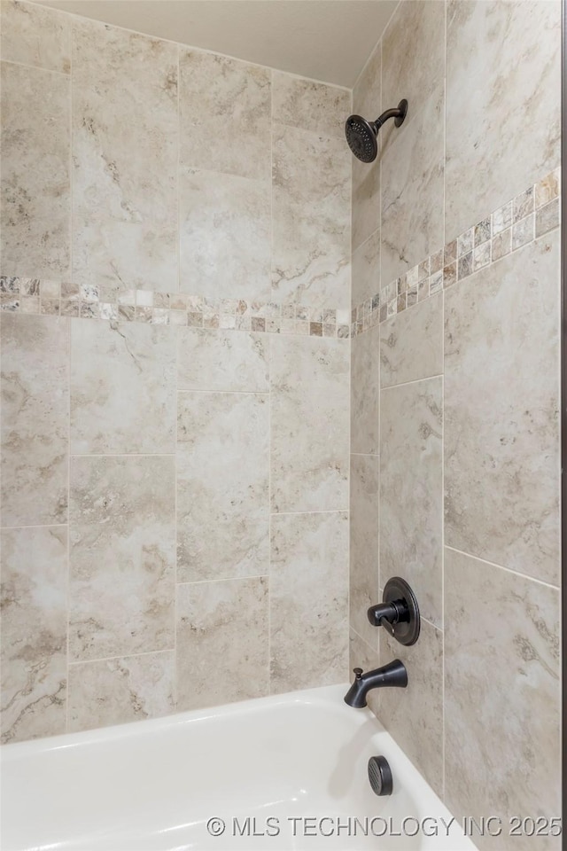 room details with shower / bathtub combination