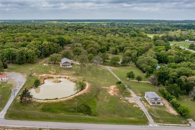 3633 Sawmill, Caddo, OK 74729 - aerial view featuring a view of trees