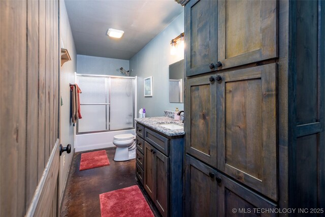 3633 Sawmill, Caddo, OK 74729 - bathroom featuring enclosed tub / shower combo, concrete flooring, toilet, and vanity