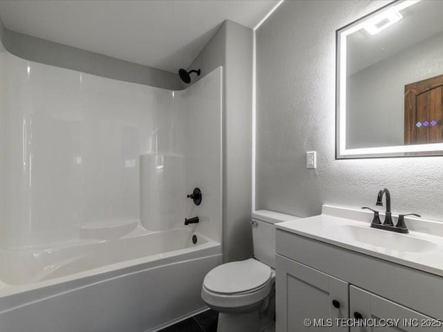 322 W Seneca St, Nowata, OK 74048 - full bath with a textured wall, shower / bath combination, vanity, and toilet