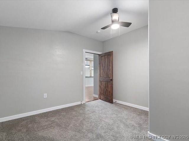 322 W Seneca St, Nowata, OK 74048 - carpeted empty room with baseboards and ceiling fan