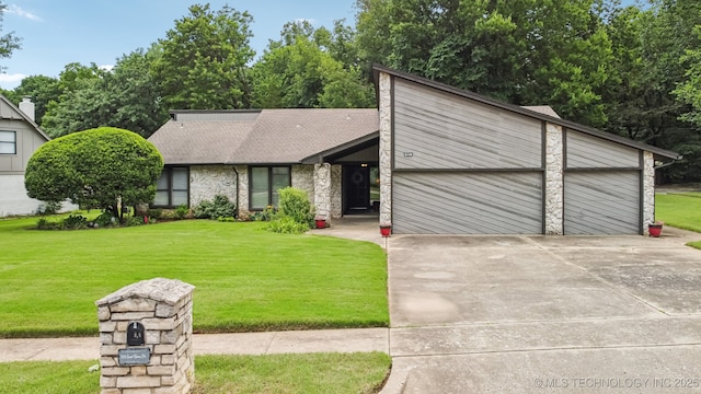 501 E Yuma Dr, Broken Arrow, OK 74011 - mid-century home featuring a front yard, concrete driveway, a shingled roof, and an attached garage