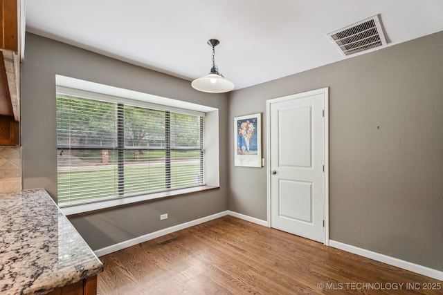 501 E Yuma Dr, Broken Arrow, OK 74011 - unfurnished dining area featuring wood finished floors