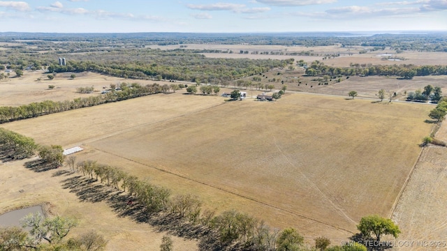 birds eye view of property featuring a rural view