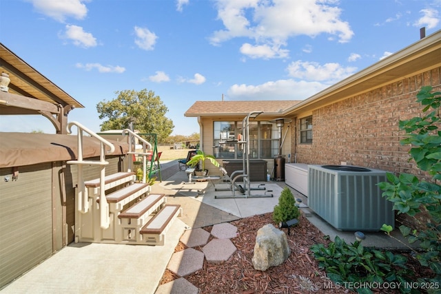 view of patio / terrace with central AC unit
