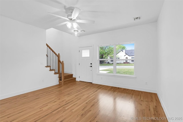 924 S Allegheny Ave, Tulsa, OK 74112 - foyer entrance featuring baseboards, stairs, visible vents, and light wood-type flooring