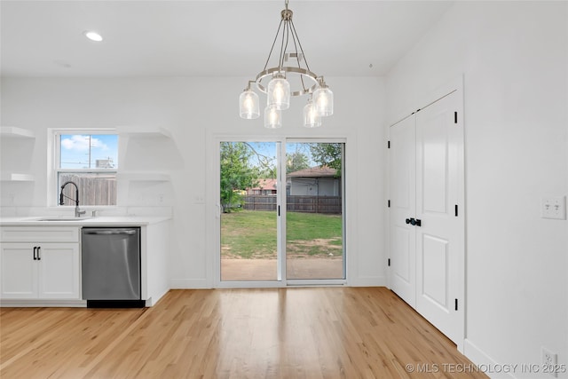 924 S Allegheny Ave, Tulsa, OK 74112 - interior space with light wood-style flooring, baseboards, a notable chandelier, and a sink