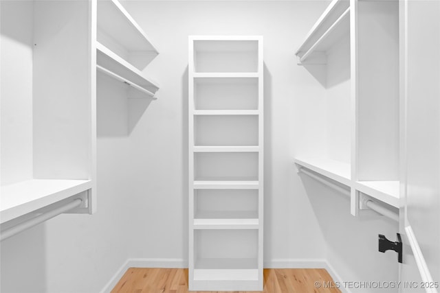 924 S Allegheny Ave, Tulsa, OK 74112 - spacious closet with wood finished floors