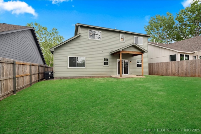 924 S Allegheny Ave, Tulsa, OK 74112 - rear view of property with a patio area, a fenced backyard, a yard, and central AC unit