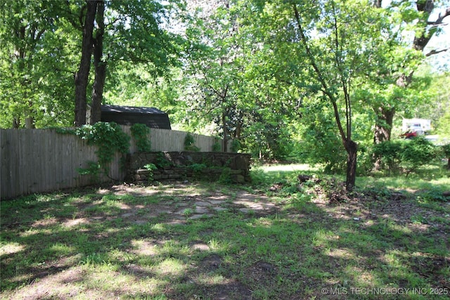 view of yard featuring fence