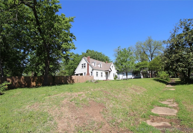 view of yard with fence