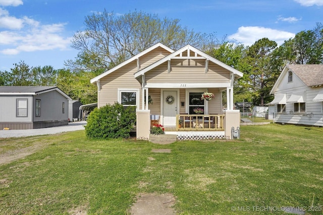 722 S Hughes Ave, Morris, OK 74445 - bungalow-style home featuring a porch and a front yard