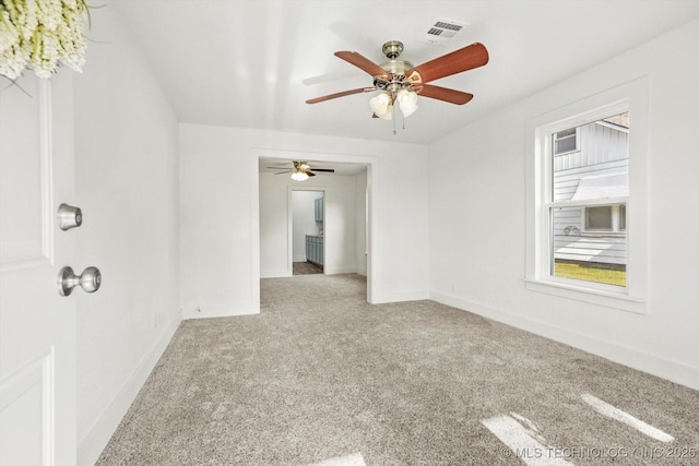 722 S Hughes Ave, Morris, OK 74445 - empty room featuring baseboards, visible vents, carpet floors, and ceiling fan