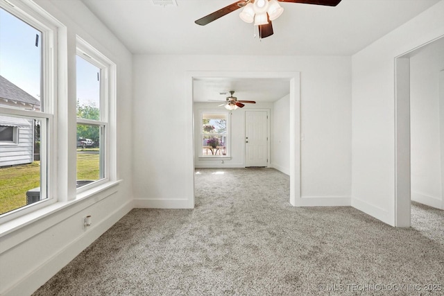 722 S Hughes Ave, Morris, OK 74445 - unfurnished room with carpet, a ceiling fan, and baseboards