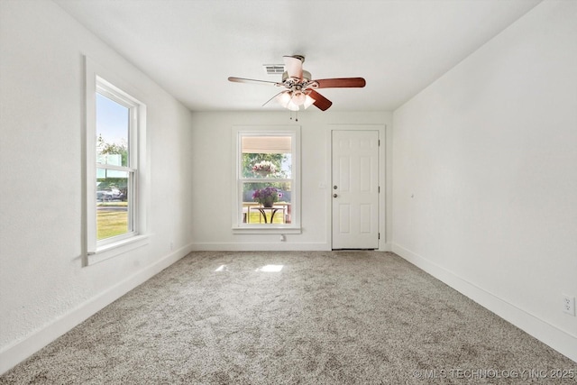 722 S Hughes Ave, Morris, OK 74445 - carpeted empty room featuring a ceiling fan, a healthy amount of sunlight, and visible vents