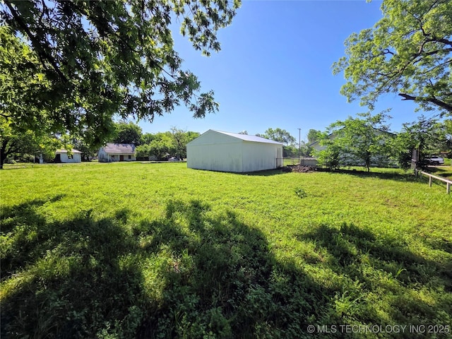 602 N Collins Ave, Okmulgee, OK 74447 - view of yard with a pole building and an outbuilding