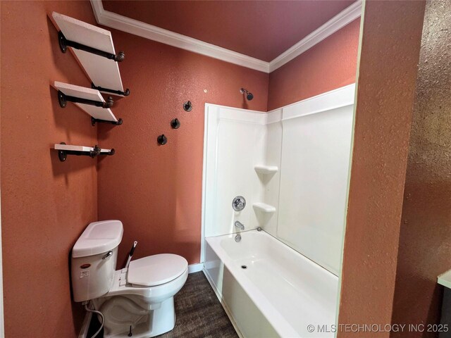 602 N Collins Ave, Okmulgee, OK 74447 - full bath with crown molding, baseboards, bathtub / shower combination, and toilet