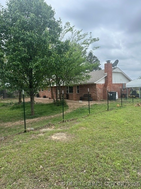 1414 N Eagle Rd, Yale, OK 74085 - view of yard featuring fence