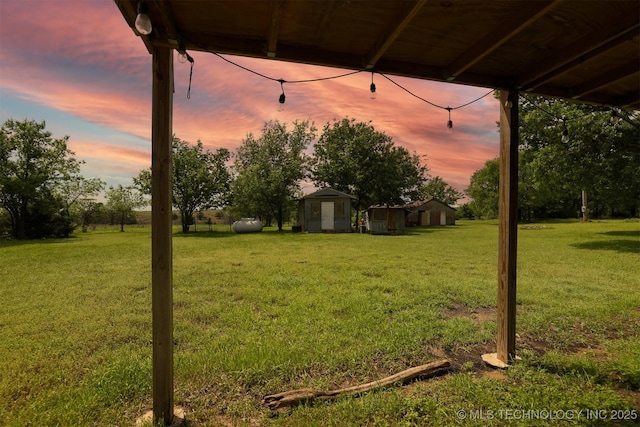 1414 N Eagle Rd, Yale, OK 74085 - view of yard with an outbuilding and a storage shed
