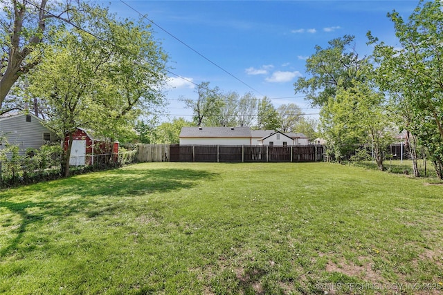 view of yard with a fenced backyard