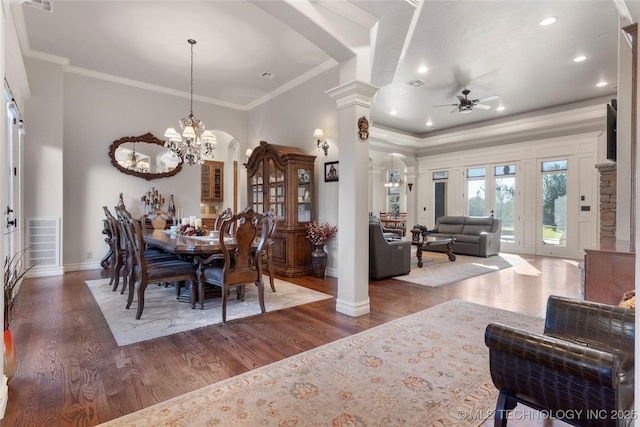 5905 W Charleston St, Broken Arrow, OK 74011 - dining space with ceiling fan with notable chandelier, visible vents, arched walkways, and crown molding