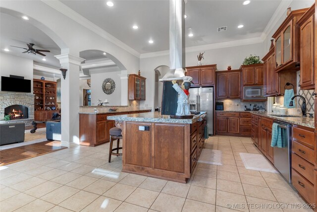 5905 W Charleston St, Broken Arrow, OK 74011 - kitchen with ceiling fan, a sink, appliances with stainless steel finishes, and light tile patterned flooring
