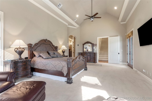 5905 W Charleston St, Broken Arrow, OK 74011 - carpeted bedroom featuring baseboards, visible vents, arched walkways, and high vaulted ceiling