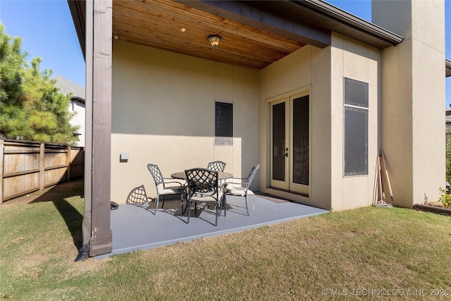 5905 W Charleston St, Broken Arrow, OK 74011 - view of patio / terrace with fence and french doors