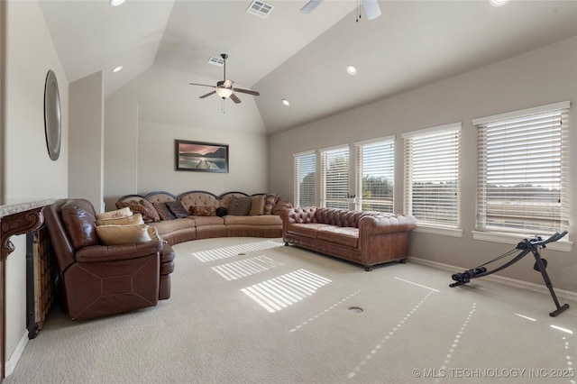 5905 W Charleston St, Broken Arrow, OK 74011 - carpeted living area with lofted ceiling, baseboards, visible vents, and ceiling fan