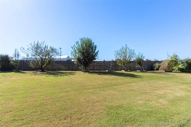 5905 W Charleston St, Broken Arrow, OK 74011 - view of yard featuring a fenced backyard