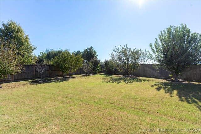 5905 W Charleston St, Broken Arrow, OK 74011 - view of yard with a fenced backyard