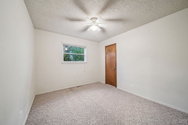 3316 S Ash Pl, Broken Arrow, OK 74012 - carpeted spare room featuring baseboards, a ceiling fan, and a textured ceiling