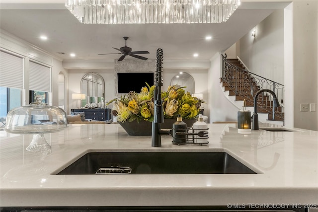4416 S Orange Ave, Broken Arrow, OK 74011 - details with a ceiling fan, a sink, light countertops, ornamental molding, and recessed lighting