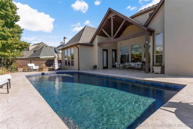 4416 S Orange Ave, Broken Arrow, OK 74011 - view of pool with fence, an outdoor living space with a fire pit, a patio, and a fenced in pool