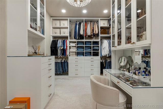 4416 S Orange Ave, Broken Arrow, OK 74011 - walk in closet with a chandelier and carpet