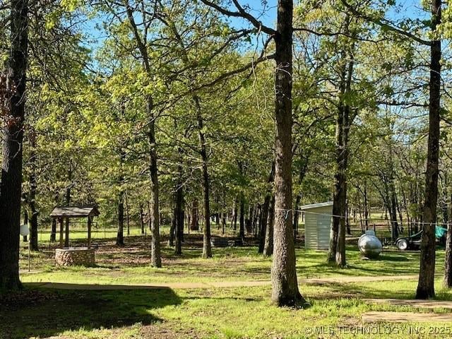 view of home's community with a lawn and a gazebo