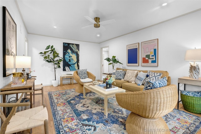 living area featuring recessed lighting, wood finished floors, and ceiling fan