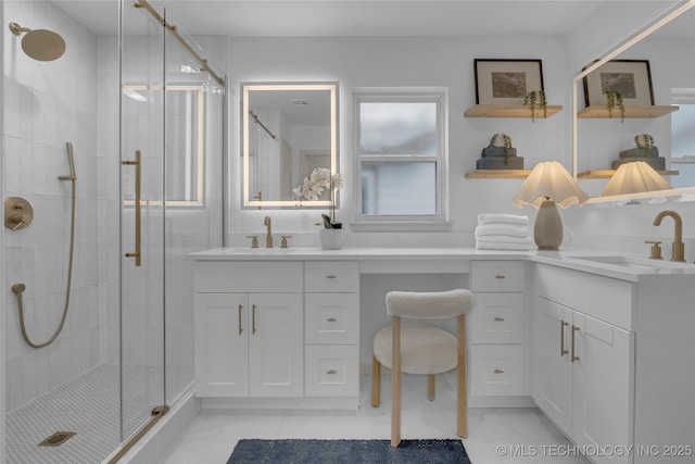 bathroom featuring a shower stall, marble finish floor, and vanity