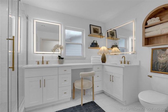 3644 S Louisville Ave, Tulsa, OK 74135 - full bathroom with marble finish floors, two vanities, toilet, and an enclosed shower