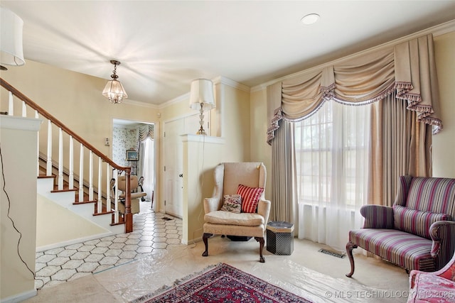 6020 S Marion Pl, Tulsa, OK 74135 - living area featuring stairway, a healthy amount of sunlight, crown molding, and visible vents